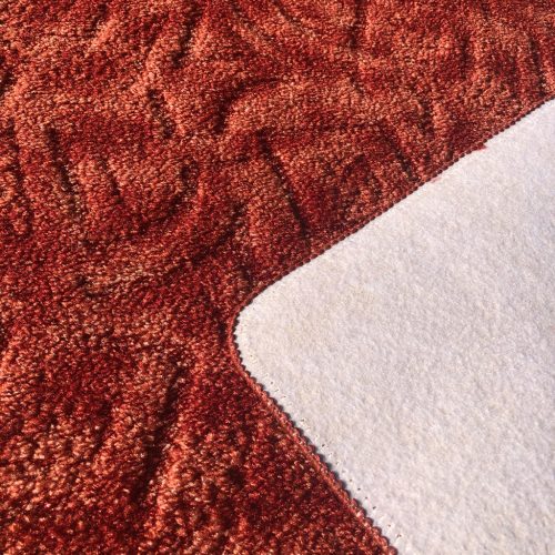Szegett szőnyeg 70x200 cm – Korallvörös színben absztrakt mintával